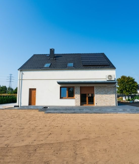 Rear,Side,Of,The,New,Build,House,With,Solar,Panel