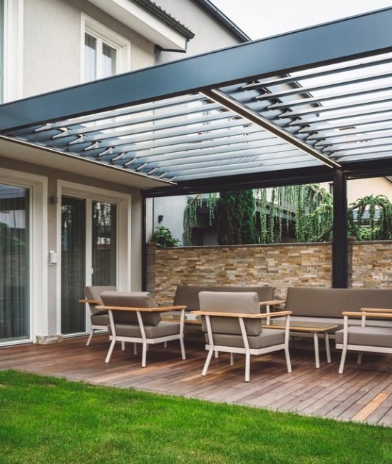 Contemporary,Backyard,Patio,Featuring,A,Sleek,Black,Metal,Pergola,With